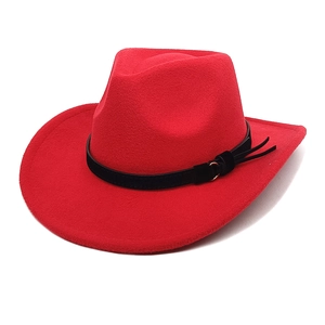 Close-up of red felt cowboy hat featuring a black leather band with silver ring and tassel