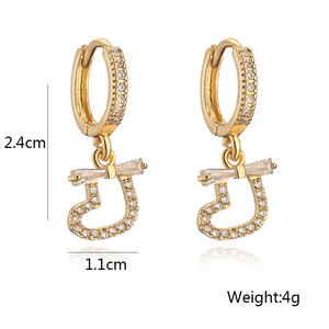 Detailed size specifications for gold heart earrings showing 2.4cm height and 1.1cm width