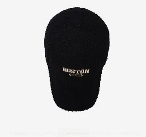 Top view of black teddy fleece baseball cap featuring detailed Boston 1630 embroidery