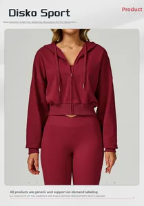 Detail view of burgundy zip-up hooded sweatshirt with ribbed hem and matching leggings
