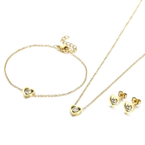 Golden heart jewelry set featuring necklace bracelet and earrings with sparkling zircon