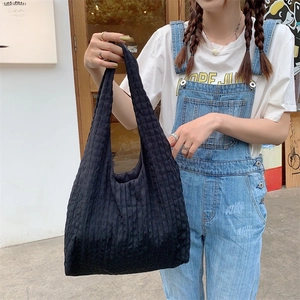 Black large capacity waffle texture tote bag for women in casual street style