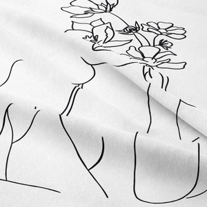 Detail shot of modern line art on high-quality fabric showing texture and folds