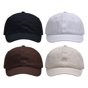 Minimalist cotton baseball caps set in black white brown and beige colors with curved brim