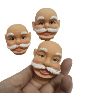 Miniature Santa Claus head figurines for DIY Christmas decorations and festive ornaments