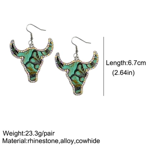 Detail view of cowhide bull head earrings with rhinestone trim and size specifications