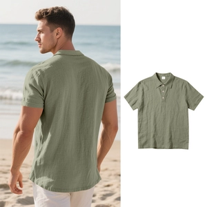 Detail of light green linen polo shirt showing texture and beach lifestyle fit