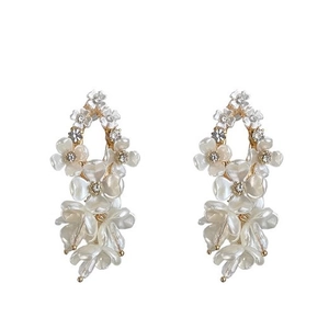 Elegant white jasmine flower drop earrings with gold petals and sparkling crystal accents