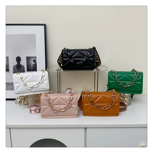Detailed display of five colorful quilted crossbody bags with chunky acrylic chains