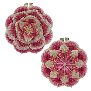 Detailed close-up of crystal rose clutch bag with pink rhinestones and metal frame