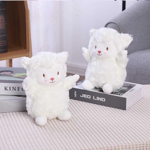Cute white plush sheep toy with bells, perfect as a soft decorative pillow for children