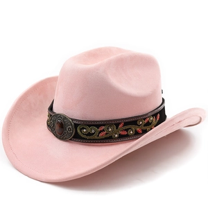 Close-up of pink suede cowboy hat with embroidered ribbon and bronze metal buckle