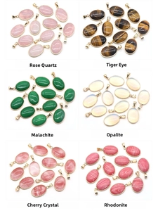 Collection of oval gemstone pendants featuring quartz and agate in gold-plated bezels