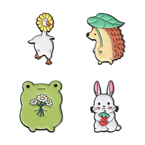 Cute cartoon animal enamel pins set featuring a hedgehog, frog, goose, and bunny for bags