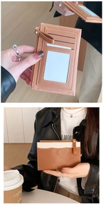 Detailed view of brown PU leather wallet featuring card slots and a clear ID window