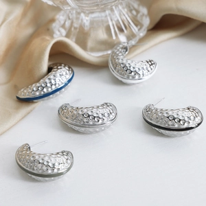 Elegant C-shaped earrings with textured silver plating and colorful enamel edges