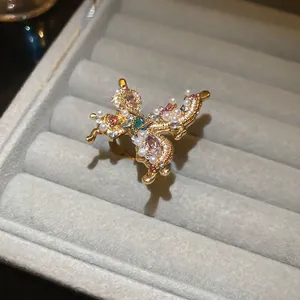 Vintage butterfly ring with colorful rhinestones and pearls on golden base