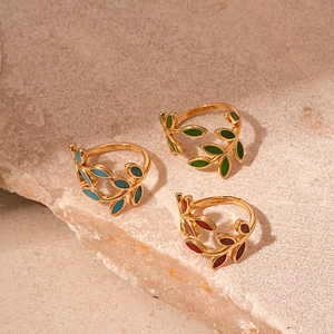 Vintage gold leaf rings with blue green and red enamel drip glaze in adjustable open design