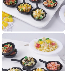 Detailed close-up of miniature pan fried rice food keychains with realistic food textures