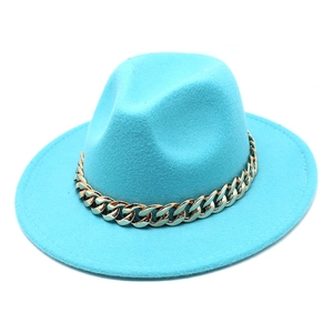 Close-up of bright blue Fedora hat featuring a chunky gold chain strap decoration