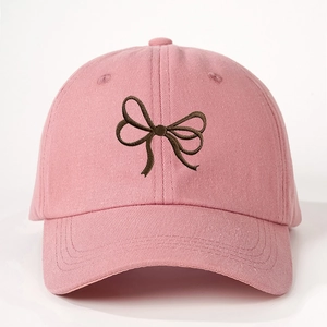 Pink cotton canvas baseball cap featuring brown embroidered double bow design for women