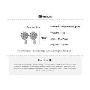 Detailed specs for floral rhinestone earrings with pearls featuring dimensions and weight