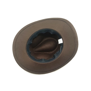 Detail shot of vintage brown jazz hat interior showing 65% cotton blend label and sweatband