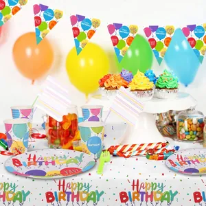 Vibrant birthday party decoration set with balloon print tablecloth and matching tableware