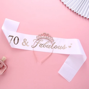 Detailed set of white 70 & Fabulous sash and rose gold rhinestone tiara for 70th birthday