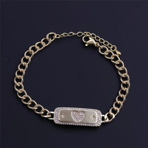Gold chain bracelet with heart zircon rectangular plate and shimmering star motifs