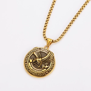 Detailed view of golden eagle pendant necklace with Philippine Eagles engraving