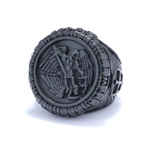 Vintage St. Michael archangel embossed black stainless steel ring for men in matte finish