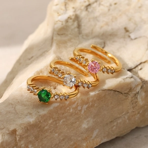 Three 18K gold-plated stainless steel rings with green, white, and pink zircon stones