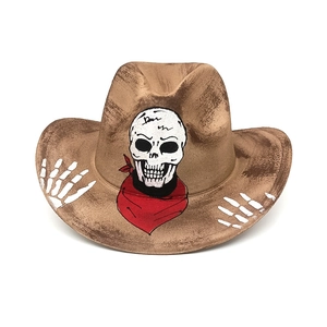 Detail of a brown cowboy hat featuring skull print and red bandana for Halloween party