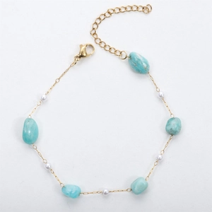 18K gold-plated bracelet with irregular natural stones and white pearls on white background
