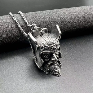 Vintage Odin viking pendant in stainless steel with a box chain on black background