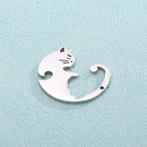 Detailed view of a silver stainless steel cat-shaped pendant with minimalist engraved outlines