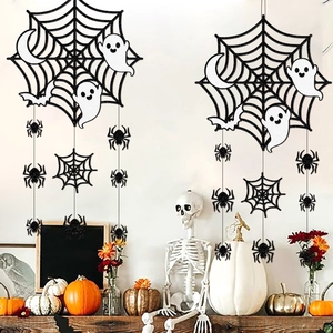 Halloween door hangers featuring spider web ghost and bat designs with glitter finish