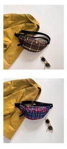 Detail of checkered canvas kids waist bags with adjustable straps and plastic buckles