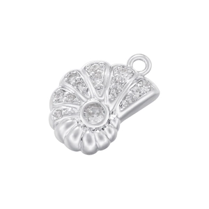 Macro shot of silver shell pendant with sparkling cubic zirconia on white background