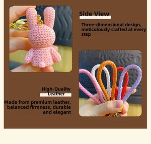 Detail of cute resin rabbit keychain featuring woven texture and colorful leather straps