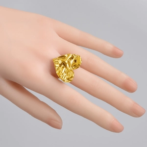 Irregular wrinkled heart ring in golden stainless steel with polished mirror finish
