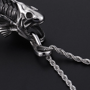 Punk style silver titanium steel fish bone pendant with rope chain on black background