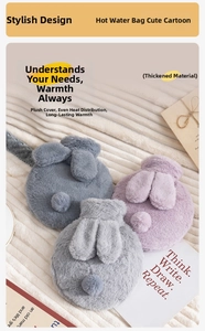 Detail of soft faux rabbit fur hot water bottle cover with cute plush bunny ears design