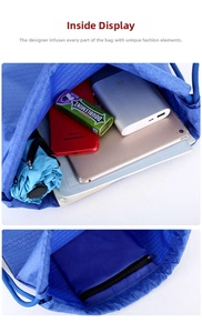Internal view of blue nylon drawstring bag showing large capacity and zipper pocket
