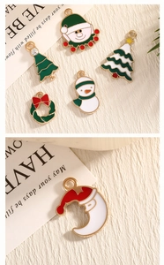 Macro shot of colorful enamel Christmas charms including Santa and festive trees