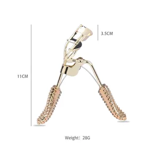 Golden stainless steel eyelash curler with anti-slip handle for natural curling