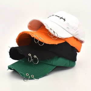 Distressed baseball caps with metal rings and embroidery in four different colors