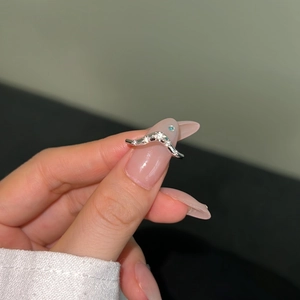 Close-up of S925 silver V-shaped ring featuring sparkling pavé zircon stones on hand
