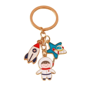 Cute golden astronaut and rocket keychain with colorful enamel stars for space lovers